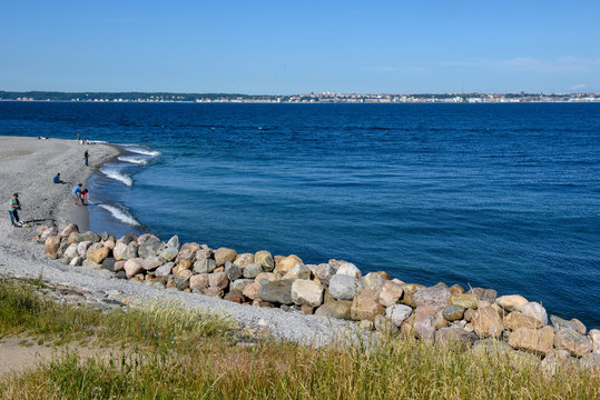 Helsingor, Denmark - 28 June 2019: the coast of Helsingor in Denmark with view to Helsingborg on Sweden