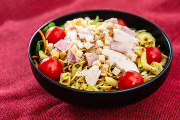 cereal specialties cooked with salad, roasted chicken aiguillette cured with salted and bacon