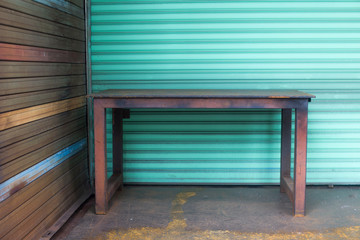Old metal table with shutter door
