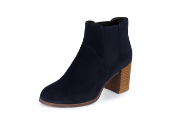 Winter female leather boots isolated on white background