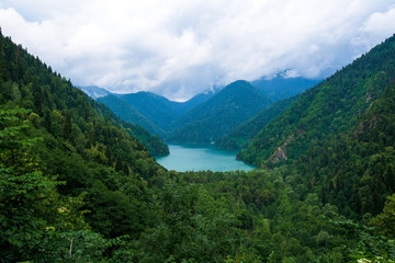 Fototapeta na wymiar blue lake among mountains in Abkhazia
