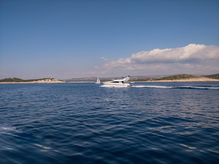 Beautiful big yacht passing beside croatian island.