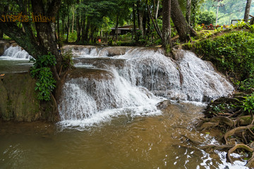 Waterfall in autumn forest, Kanchanaburi, thailand.