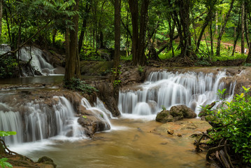 Fototapeta na wymiar Waterfall in autumn forest, Kanchanaburi, thailand.