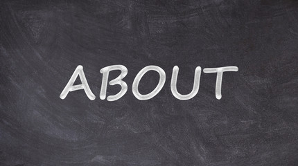 Obraz premium About written on blackboard with light bulbs