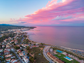 The incredible sunset over L'Ampolla, Catalonia, Spain. Drone aerial photo