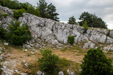 View of Mount Ai-Petri, landscape. Light sunny summer day, clouds, Crimea, Yalta, Russia.