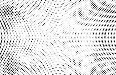 Abstract radial halftone texture. Monochrome background of black dots on white.