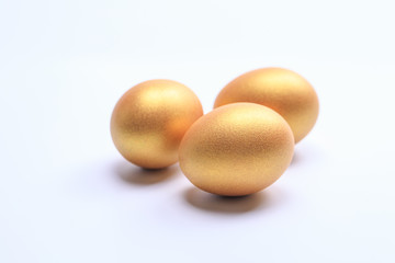 golden egg isolated on white background