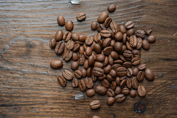 coffee beans on wooden background