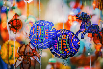 Colorful of tradition lanterns hanging on street in chinatown  lantern market, Saigon, Vietnam. Many kind of beautiful plastic lanterns in Mid Autumn Festival. National and cultural holiday. © Longct84