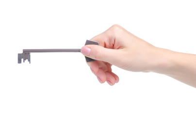 Old key in hand on white background isolation