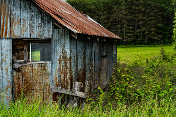 landscape of abandoned old barns