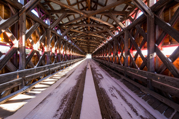 covered bridge landscape in winter