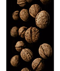 walnuts on black background