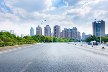 cityscape and skyline of chongqing from empty asphalt road