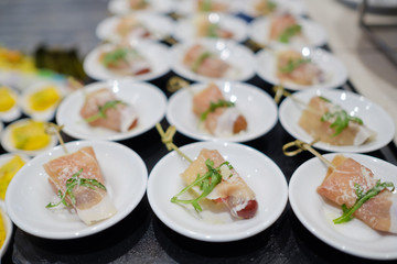 buffet food, catering food party at restaurant, mini canapes, snacks and appetizers