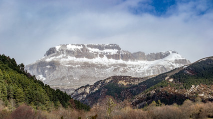 Landscape of the pirenair mountains In Aragon spain snowing