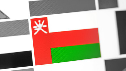 Oman national flag of country. Oman flag on the display, a digital moire effect.