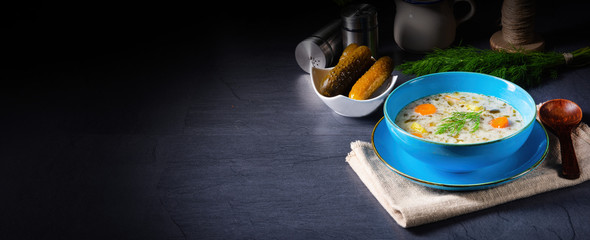 Polish sour cucumber soup or salt cucumber soup.