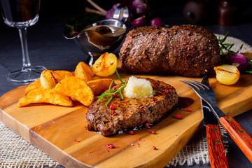 Butter Beef Steak with herbs and potato wedges