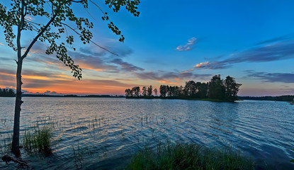 Colorful sunset on lake Vuoksa in the Leningrad region