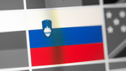 Fototapeta na wymiar Slovenia national flag of country. Slovenia flag on the display, a digital moire effect.