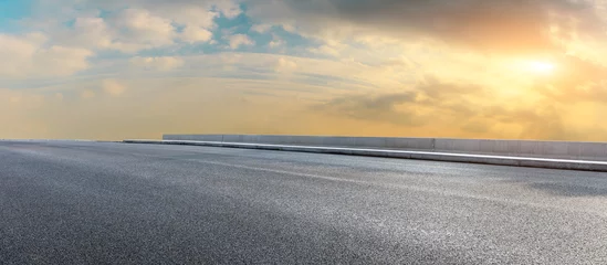 Rolgordijnen Asphalt highway and beautiful clouds landscape at sunset © ABCDstock