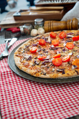 pizza cooked with standard cooked ham and mushrooms