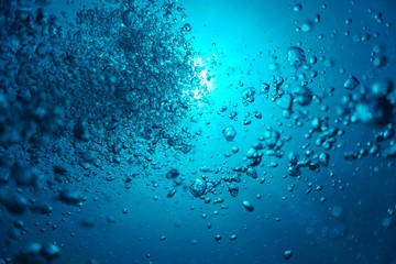 Underwaterphoto of air bubbles in the sunshine