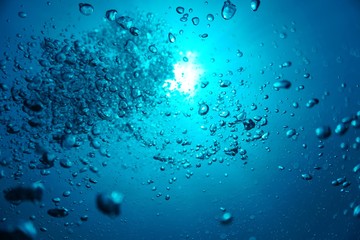 Underwaterphoto of air bubbles in the sunshine