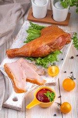  smoked chicken legs with fresh vegetables and seasonings