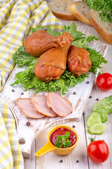  smoked chicken legs with fresh vegetables and seasonings