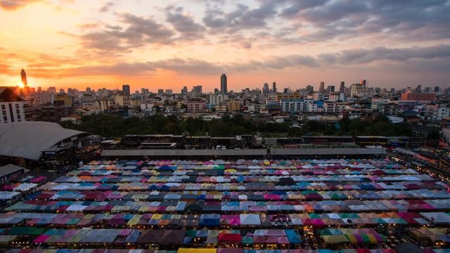 TD, Night market called train night market Ratchada at evening to night TL D2N bird eye view, people can enjoy many street food, located at back of Esplanade Ratchadapisek Department store, Bangkok