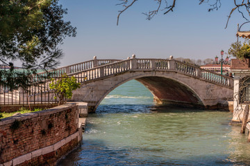 Fototapeta na wymiar Bridge in Riva San Biasio in Venice near the Venetian Arsenal