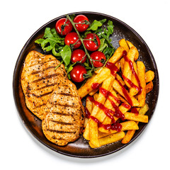 Grilled chicken fillet with french fries on white background