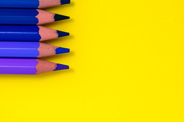 color pencil with yellow paper background