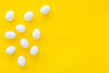 Fresh eggs for organic food on yellow background top view mockup