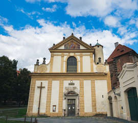Fototapeta premium The Church of the Assumption of the Virgin Mary is a Romanesque basilica, located in a small town Plasy, Plzen Region, Czech Republic