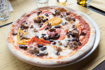 Neapolitan pizza sausage with peppers and mushrooms