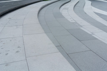 Large arched stairs made from granite.