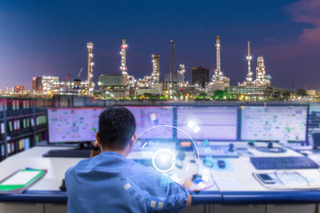 Double exposure of Engineering works with the tablet in the production control room.Control room of a steam Turbine,Generators of the coal-fired power plant for monitor process, business and industry 