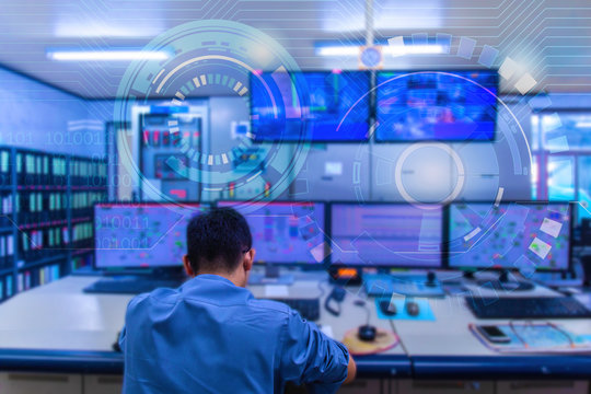 Double exposure Blurred light of man Engineering operations checking production process, Control room of a steam Turbine, Generators in the coal-fired power plant. Technology and industry concept