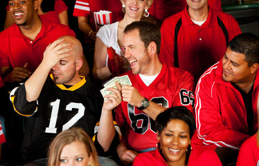 Fototapeta premium Fans: Man Has to Pay Off Bet to Friend