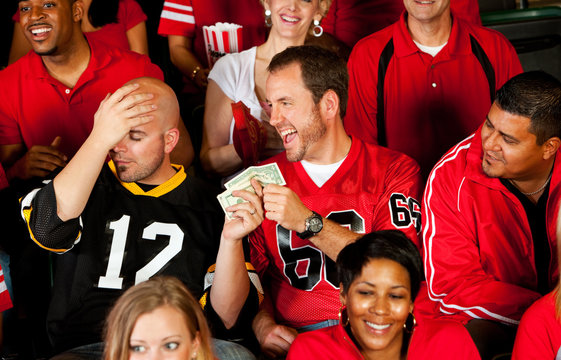 Fans: Man Has to Pay Off Bet to Friend