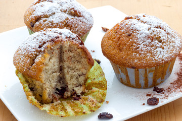 Muffins on a wooden table