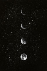 Moon phases in the night sky. Watercolor hand drawn illustration.