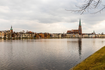 Fototapeta premium Schwerin, Germany. Views of Schwerin Cathedral (Schweriner Dom) in the Pfaffenteich, a pond lake in the middle of the city