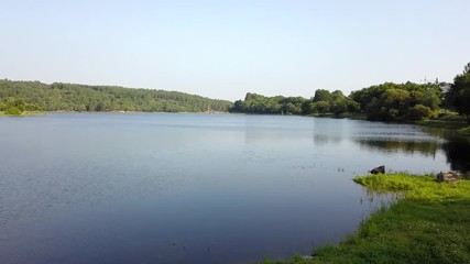 FLYING OVER A DAM SUNNY DAY