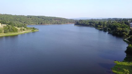 FLYING OVER A DAM SUNNY DAY